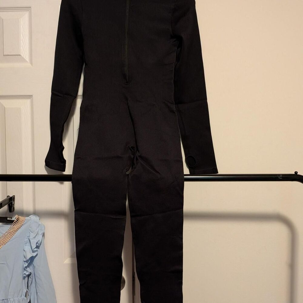 Black ribbed spandex jumpsuit with thumb holes